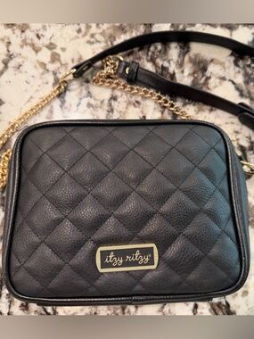 Itzy Ritzy Black Quilted Crossbody with Gold Chain Accent